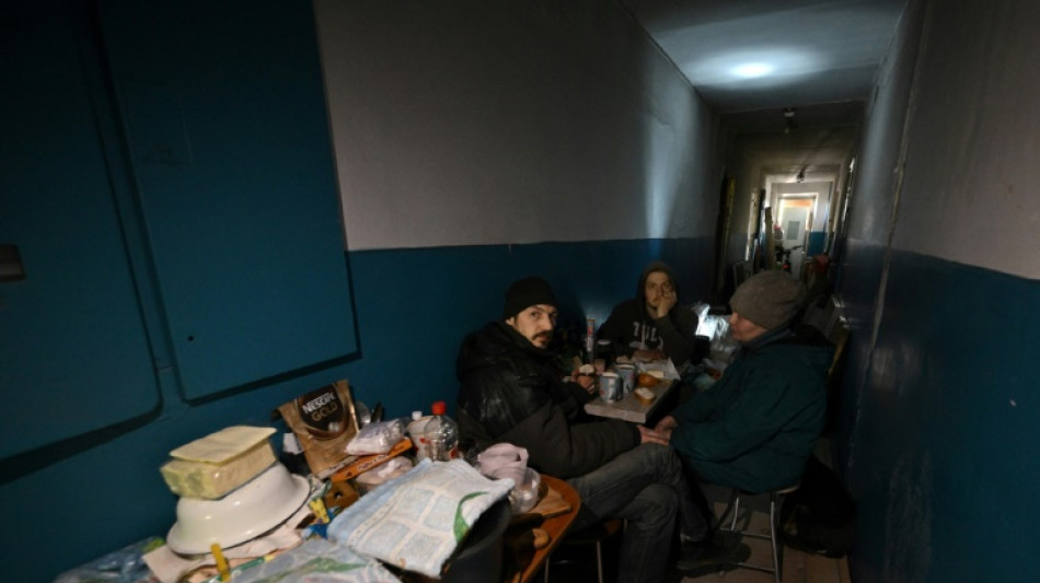 Survivors of Russian bombings cling on in flattened flats