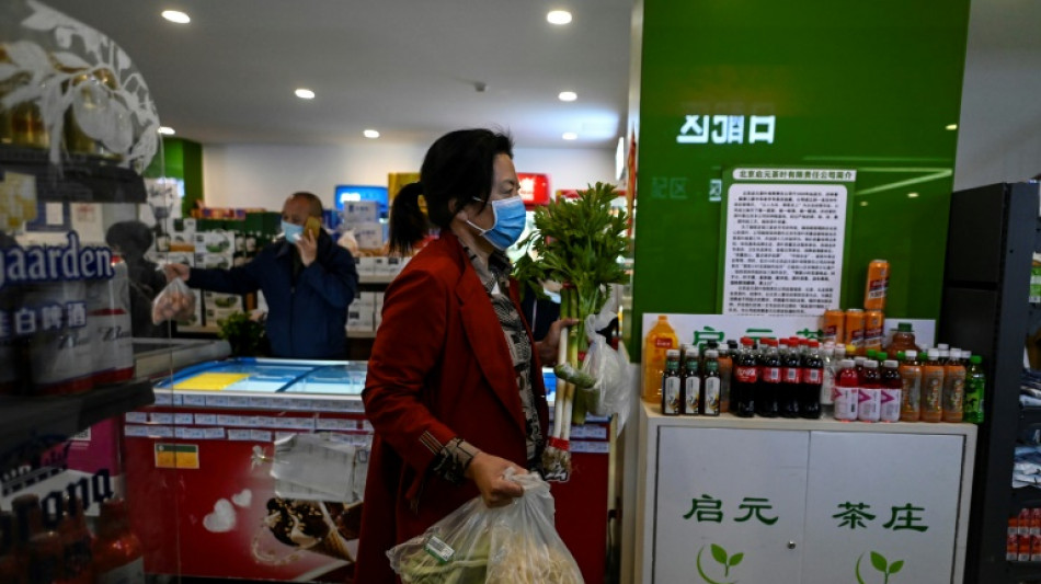 Beijing residents swamp supermarkets after lockdown rumours