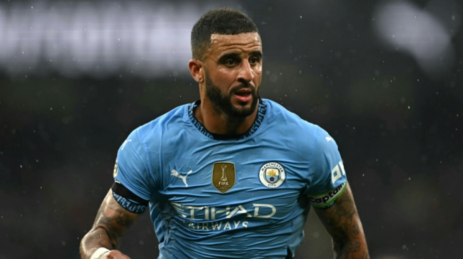 Man City's Walker calls for action after online racist abuse