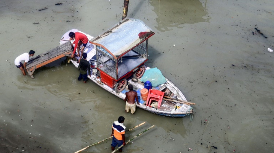 India minister blames dam release for flooding