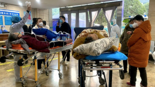 Elderly Covid patients fill hospital wards in China's major cities